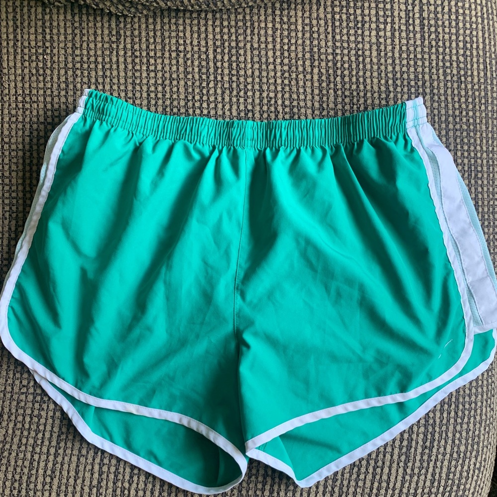 Green Nike running shorts